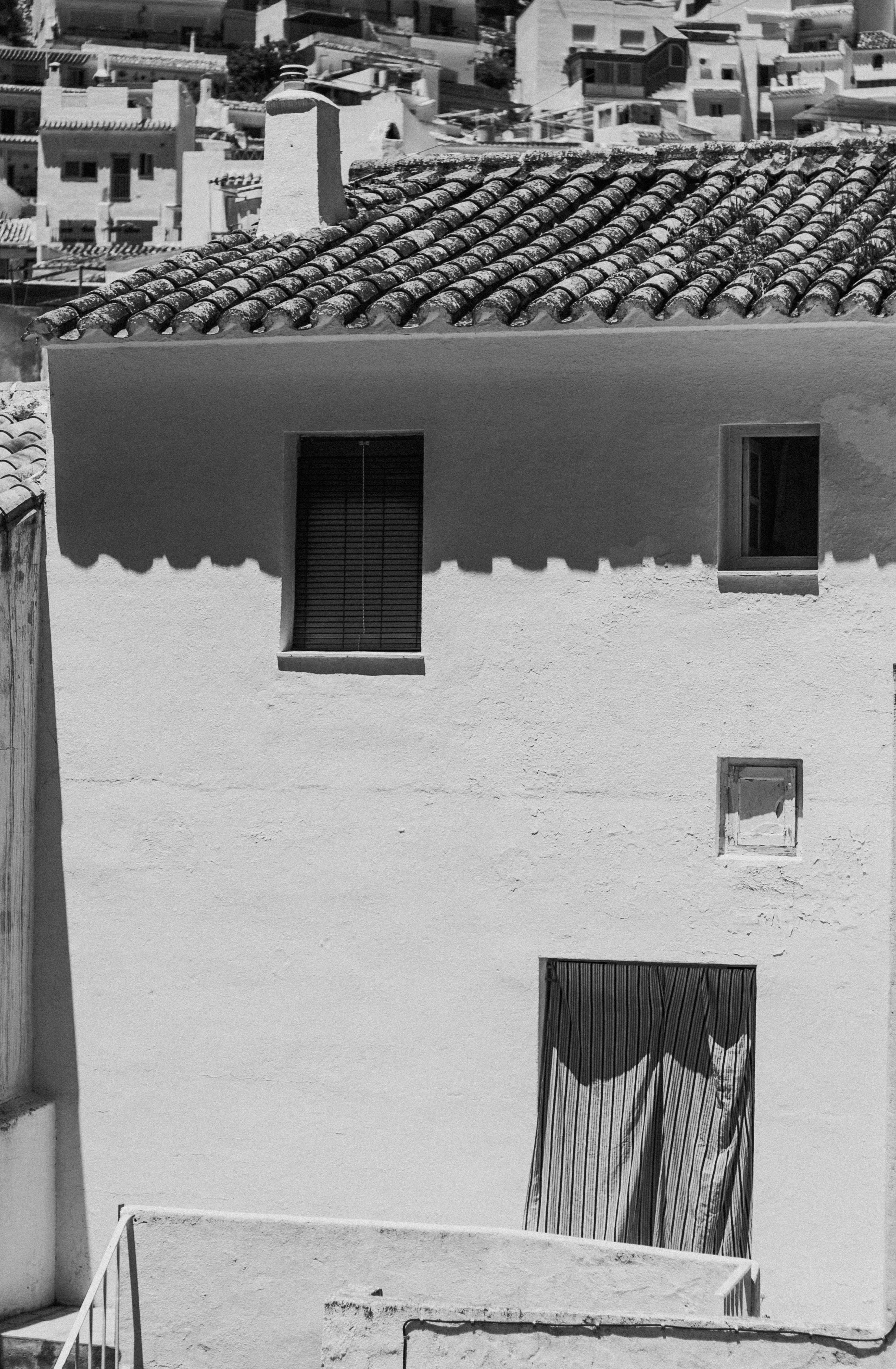 Black and white photo of classic Spanish architecture in Mijas, Andalusia.