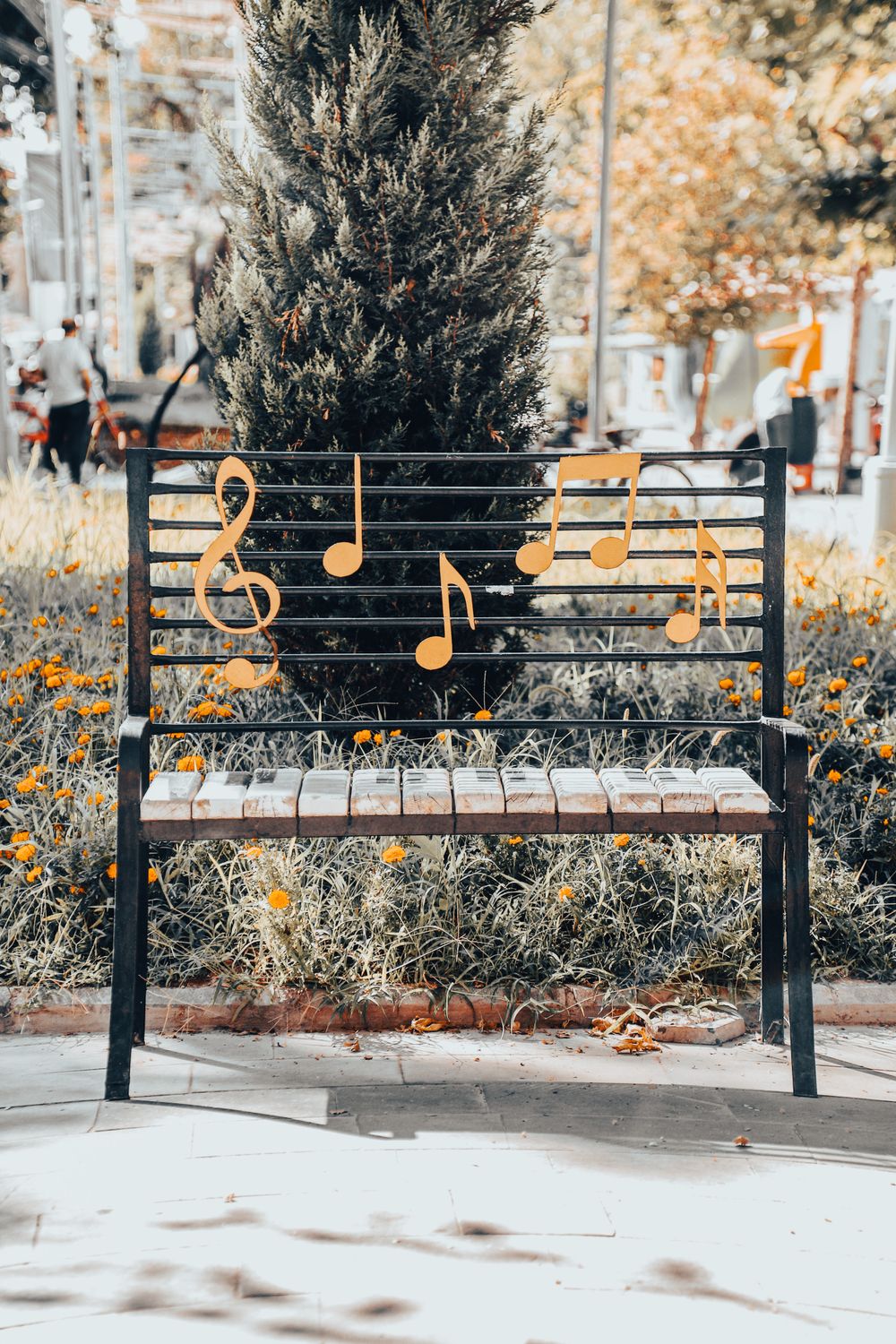 Note On Back A Steel Framed Bench with Music Notes on Back Rest · Free Stock Photo