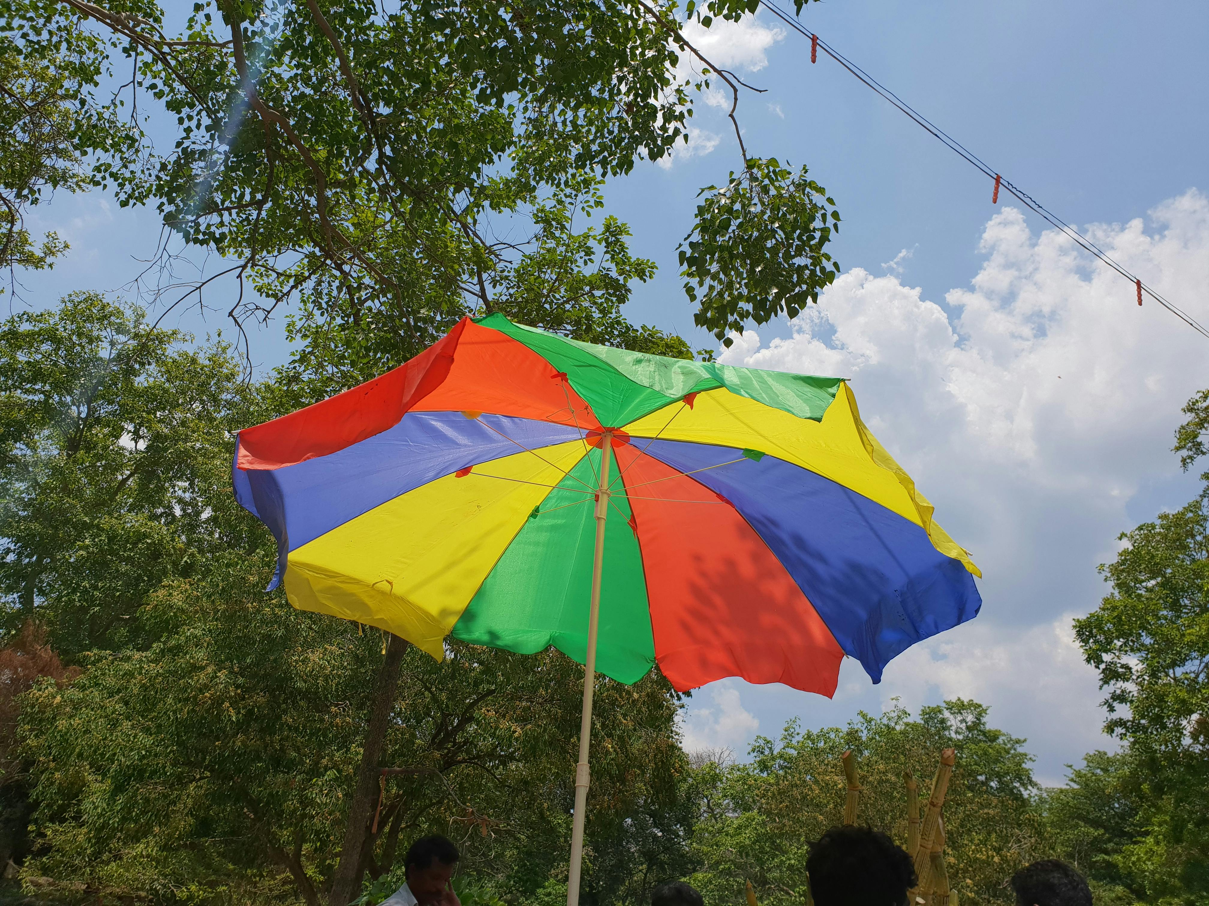 Free stock photo of big, colourful, umbrella