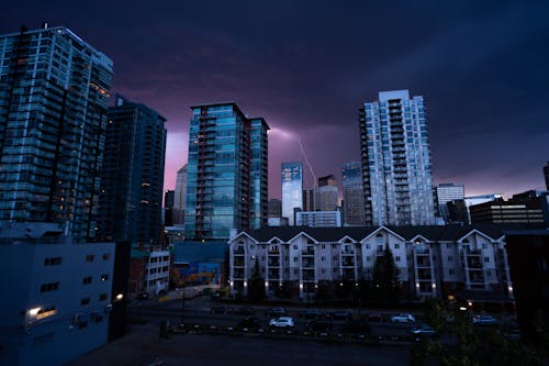 City Buildings in Lightning at Night