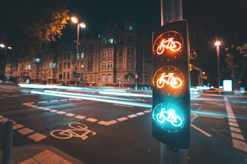 Gratis lagerfoto af byvej, cykel, gadelys