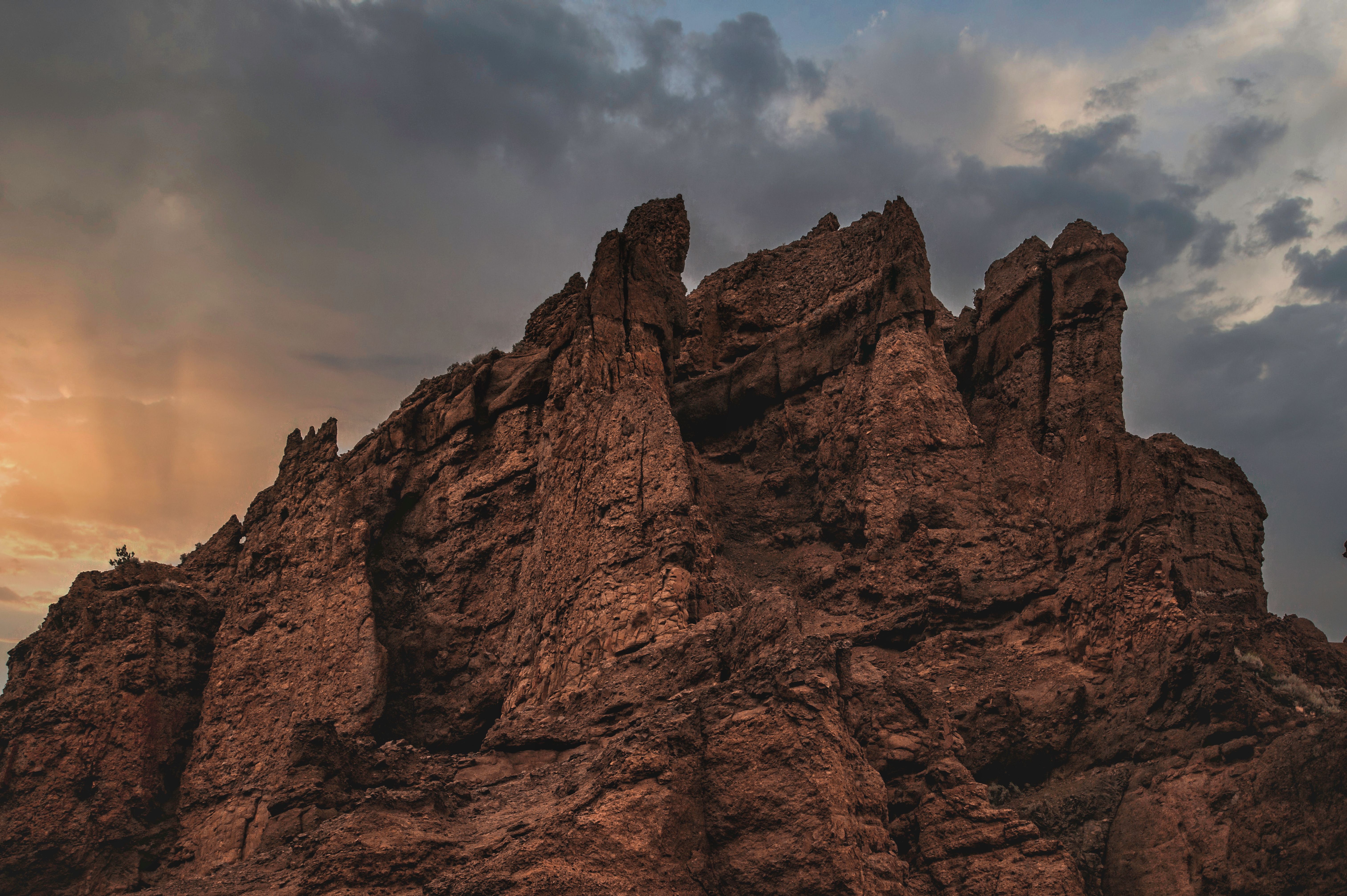 Red desert outback with ancient rock formations under blue sky