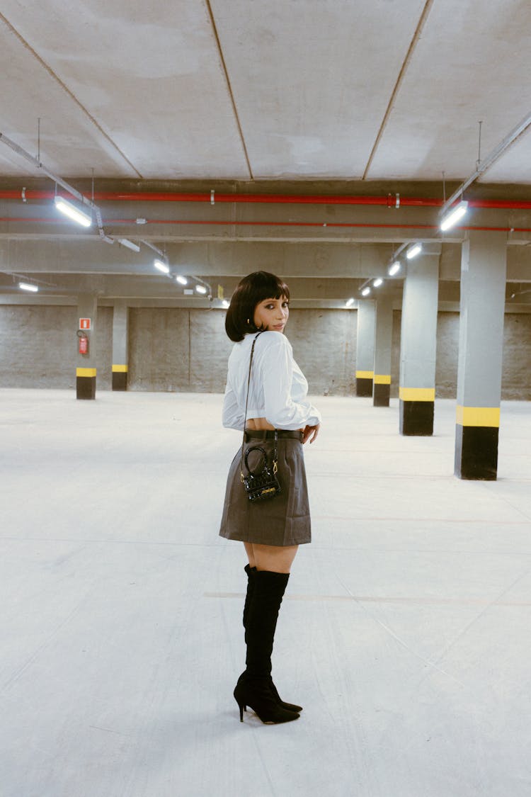 Sexy Woman In Heels Posing On Underground Parking