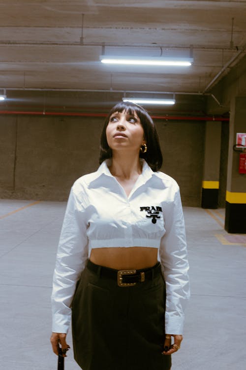 Young Fashionable Woman on an Underground Parking Lot 