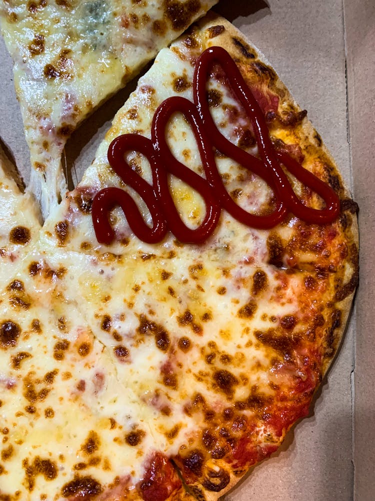 Ketchup On Pizza Slice