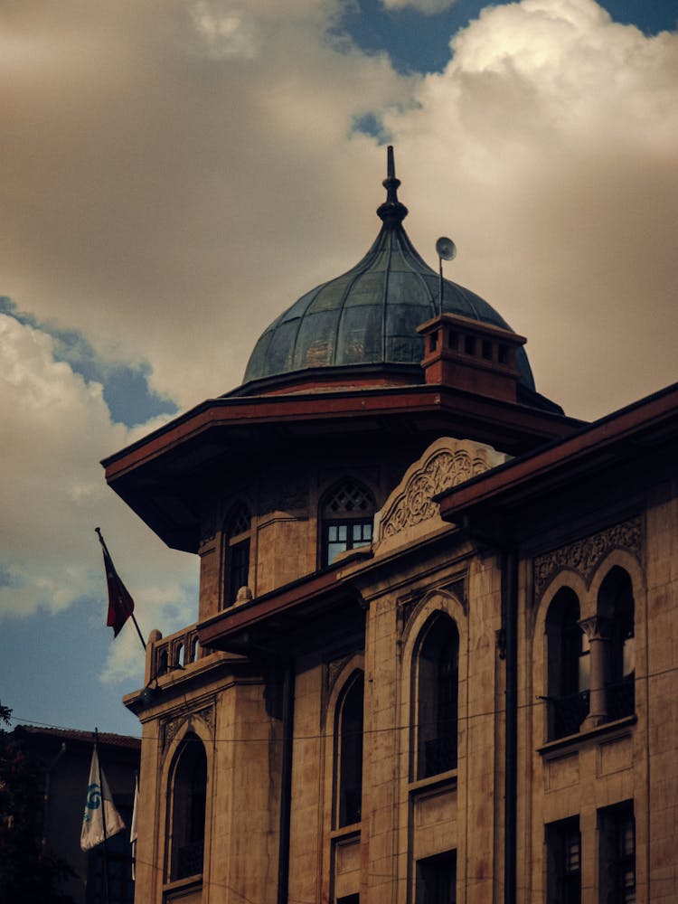 Old Building With Dome On Sky Background