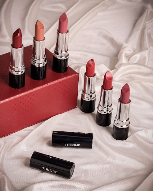 Lipsticks on White Bedding