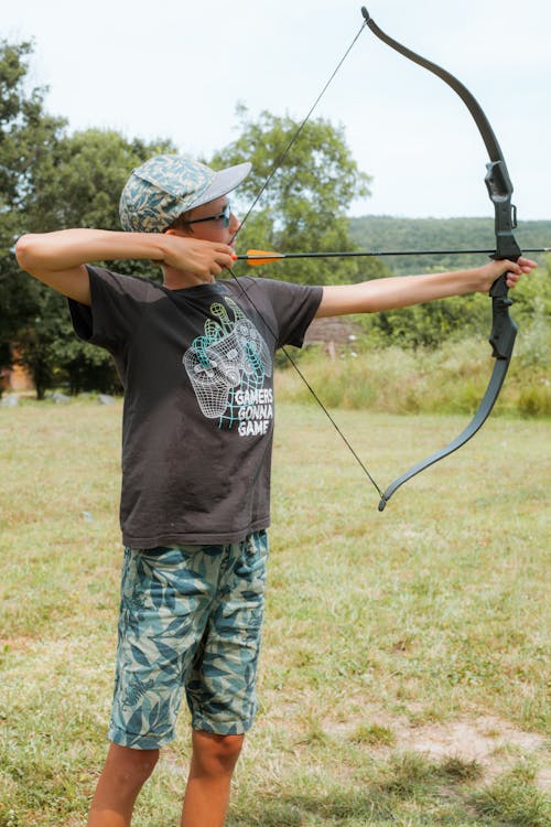 Boy Aiming With Bow