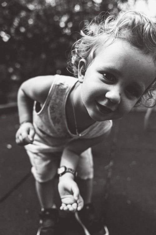 Black and White Photo of a Kid