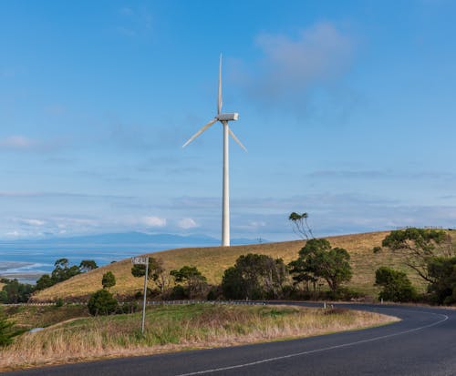 Wind Turbine Under Blue Sky 