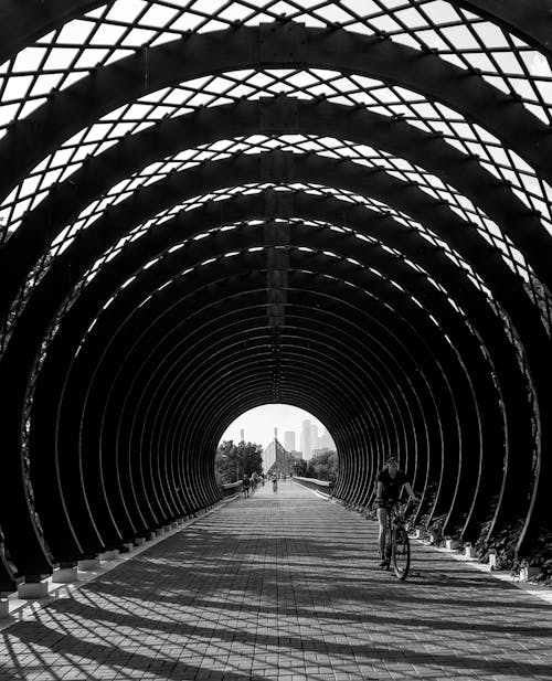 Cyclist Passing a Tunnel