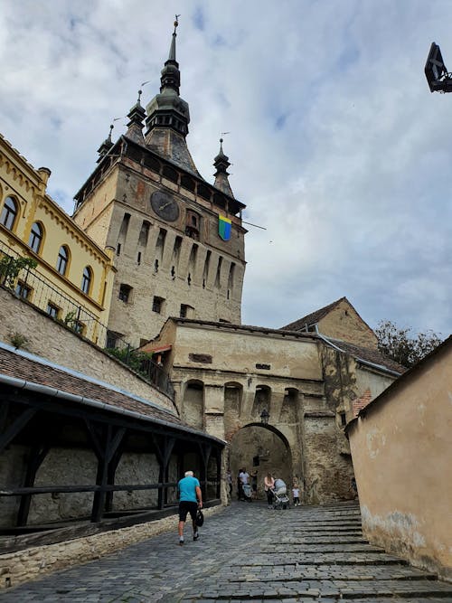 People Near the Sighisoara Clock Tower 