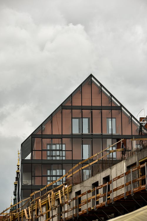 Modern Building and a Construction Site in City 