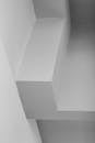 Grayscale Photo of Walls and Corners