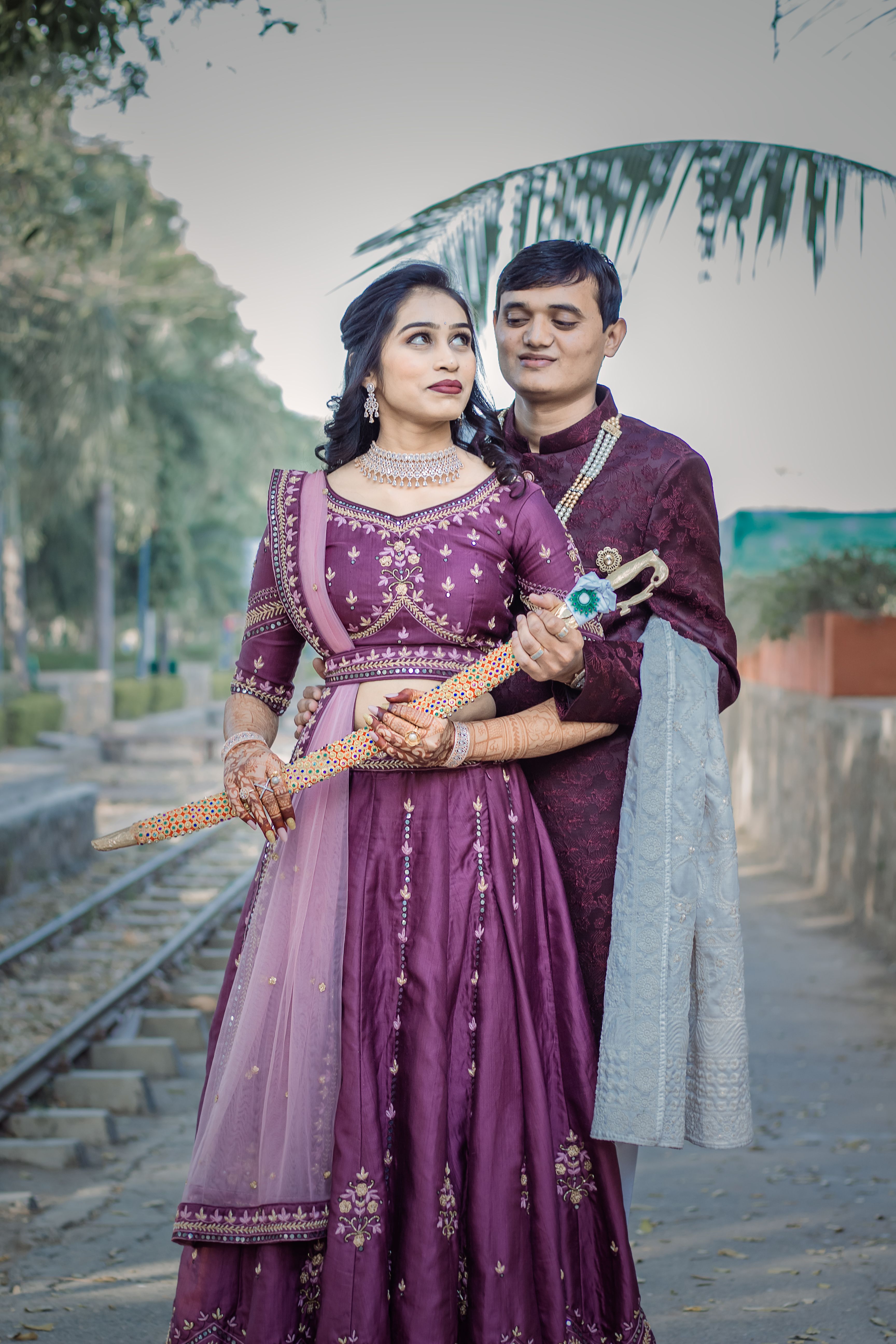 Wedding Photography of Couple in Purple Wedding Attires  Free Stock Photo