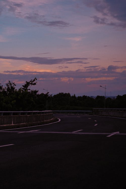 Photo of Roadway During Dawn