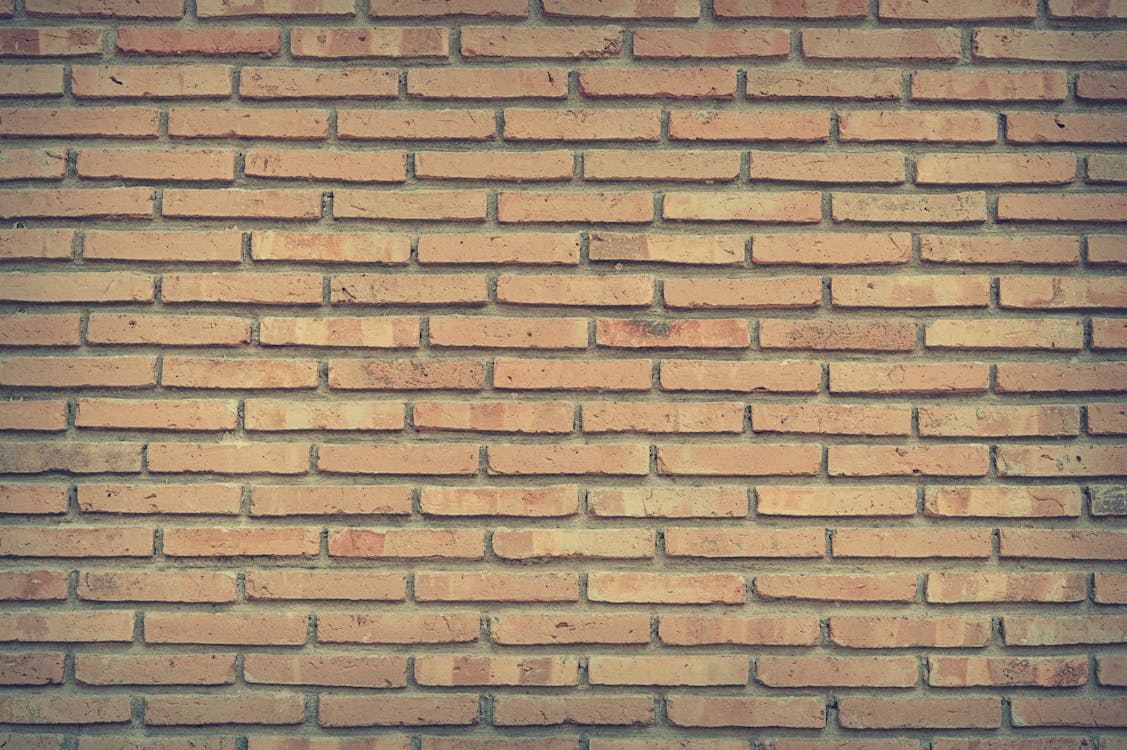 Free Brown Bricked Wall Stock Photo