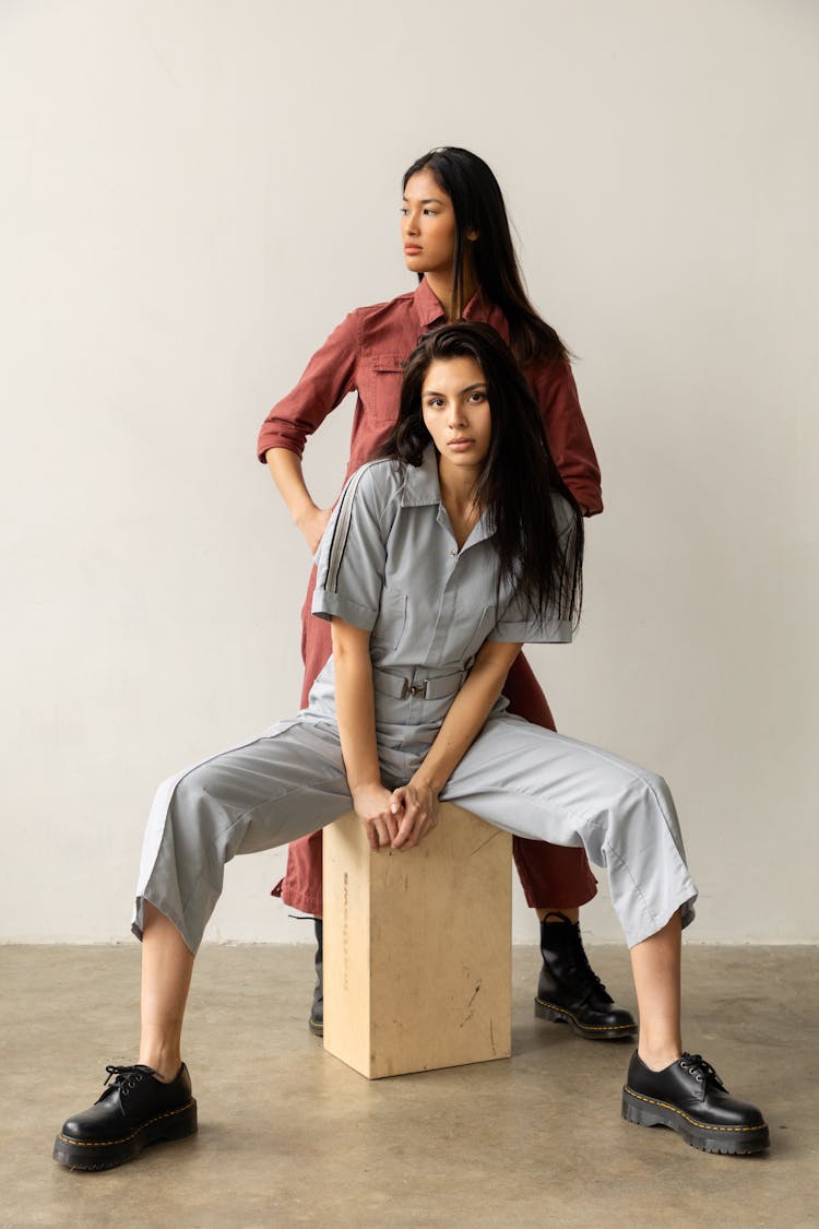 Fashion Models Posing In Jumpsuits