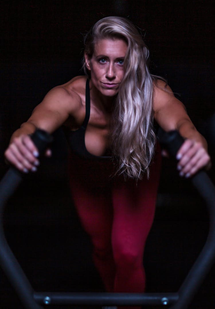 Fit Woman Exercising At The Gym 