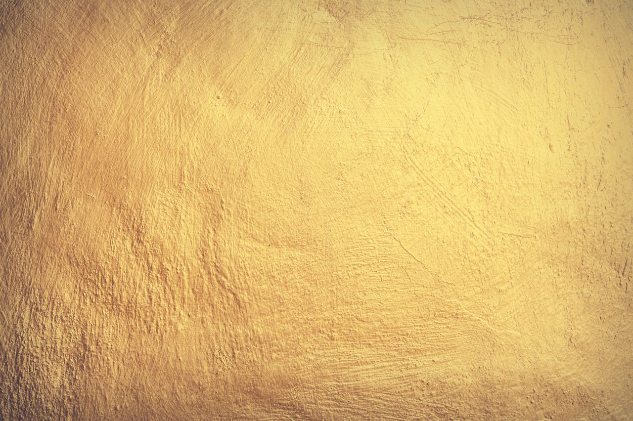 a vintage yellow stone wall texture perfect for wallpaper and design e