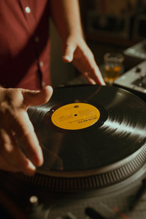 Free A Person Playing Vinyl Record Stock Photo