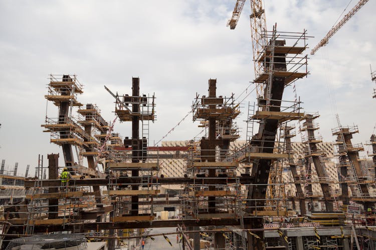 Tower Cranes On A Building Under Construction