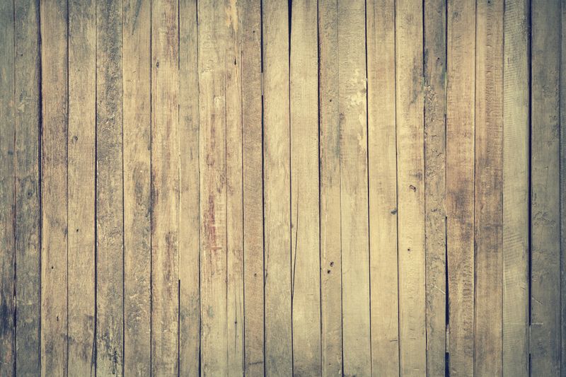 Rustic wooden planks forming a textured background, ideal for design projects.