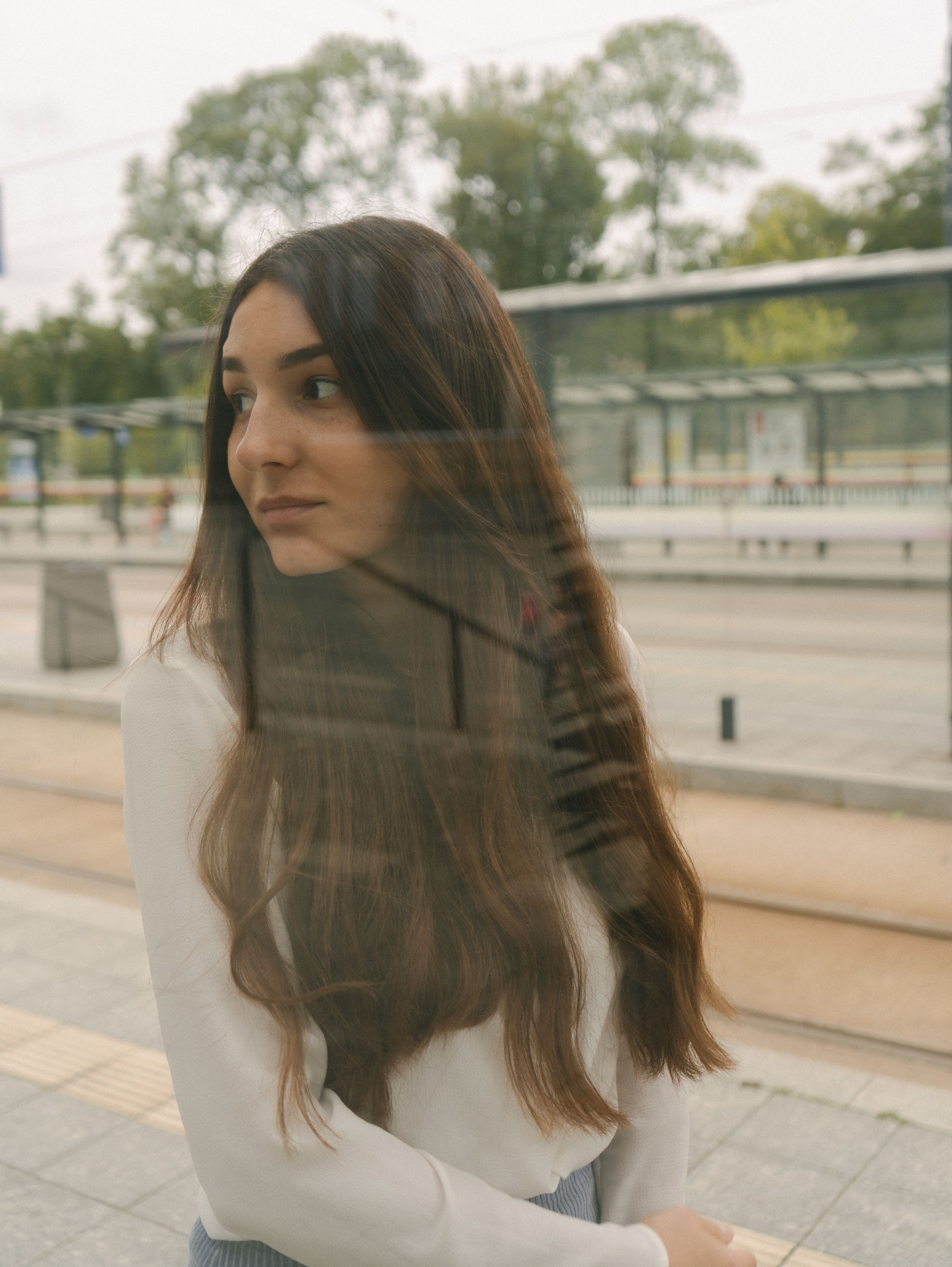 A Woman in White Long Sleeves Looking Afar · Free Stock Photo