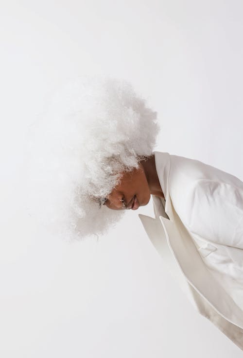 Woman in White Wig in Studio