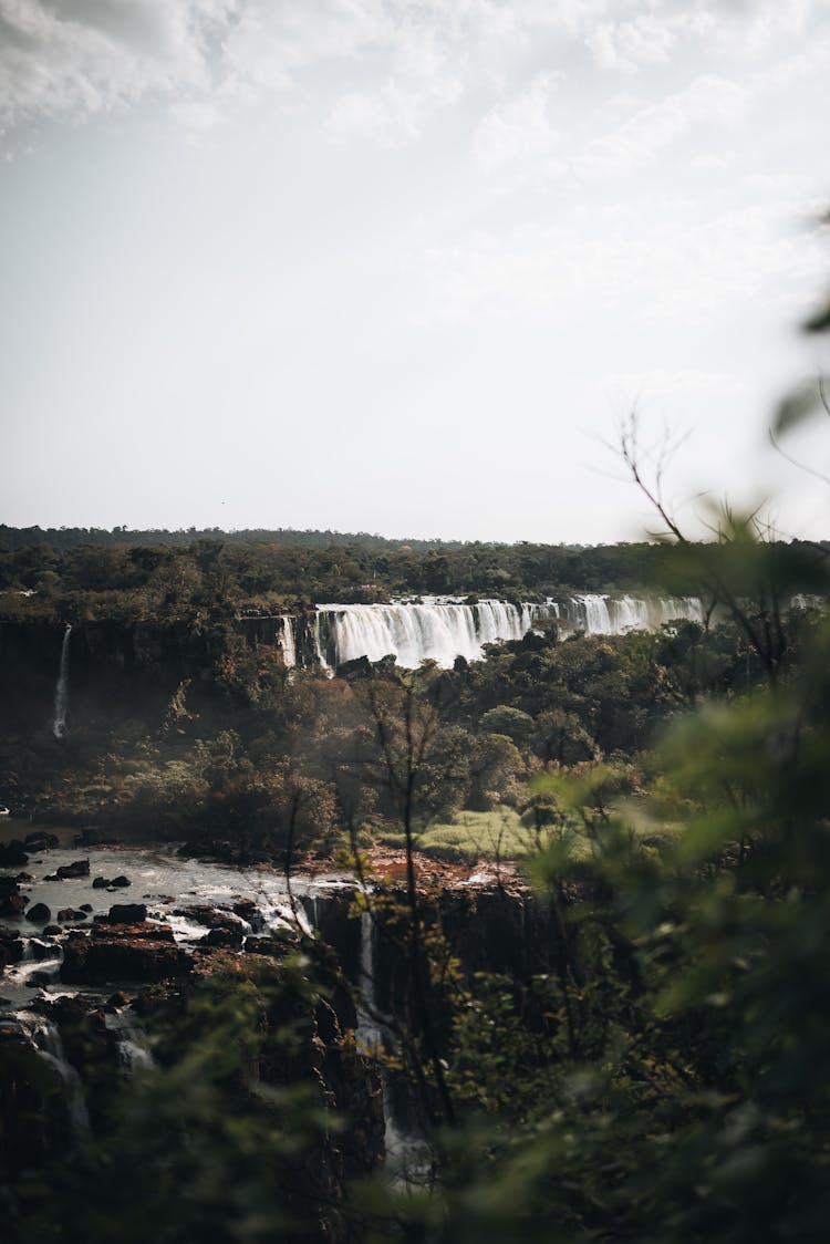 Scenic Waterfall In Nature Landscape