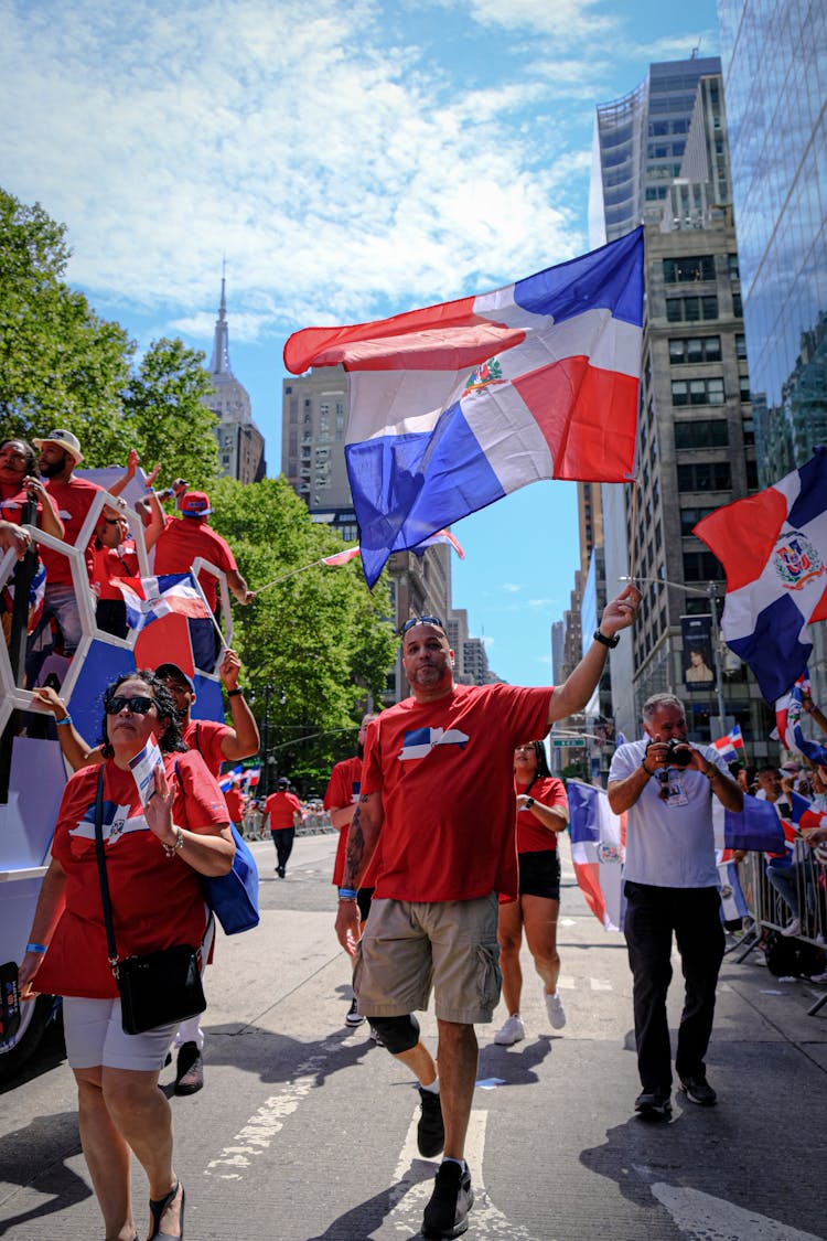 People With Dominican Flags On Street Demonstration 