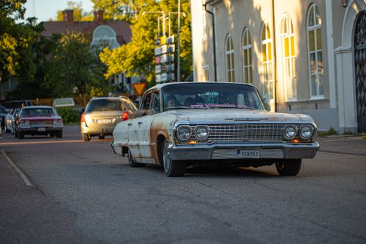 White Classic Car on Road