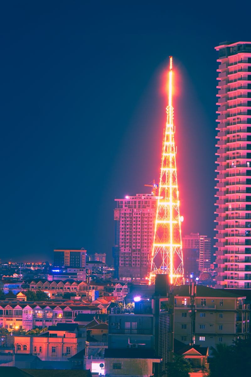 Phnom Penh evening cityscape with illuminated skyline, Cambodia