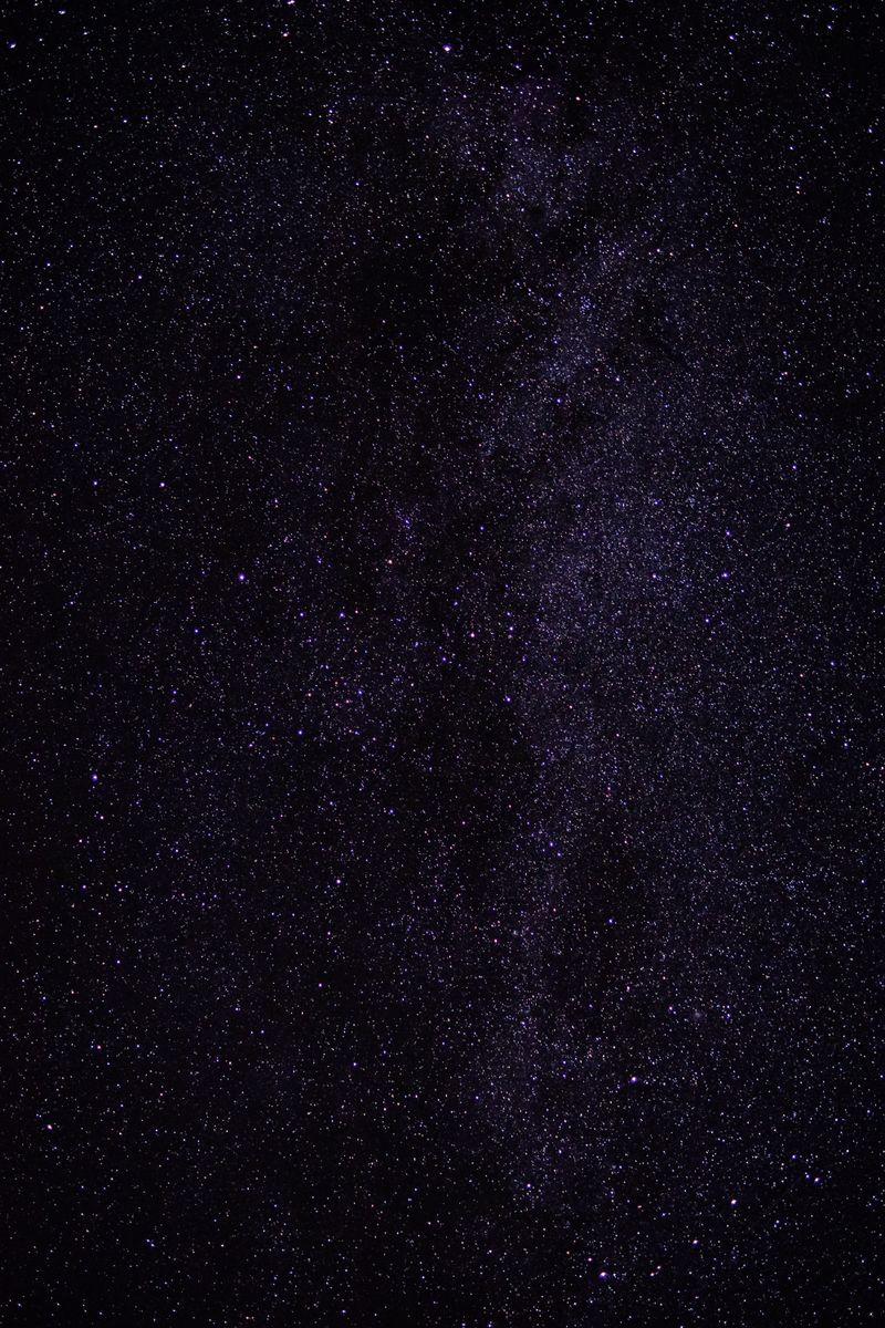 Beautiful view of a star-filled night sky featuring a dense galaxy pattern.