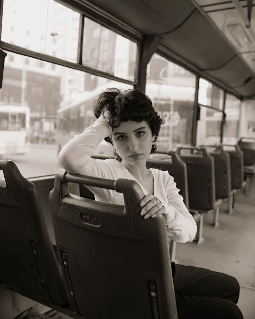 Woman Posing in Bus Seat