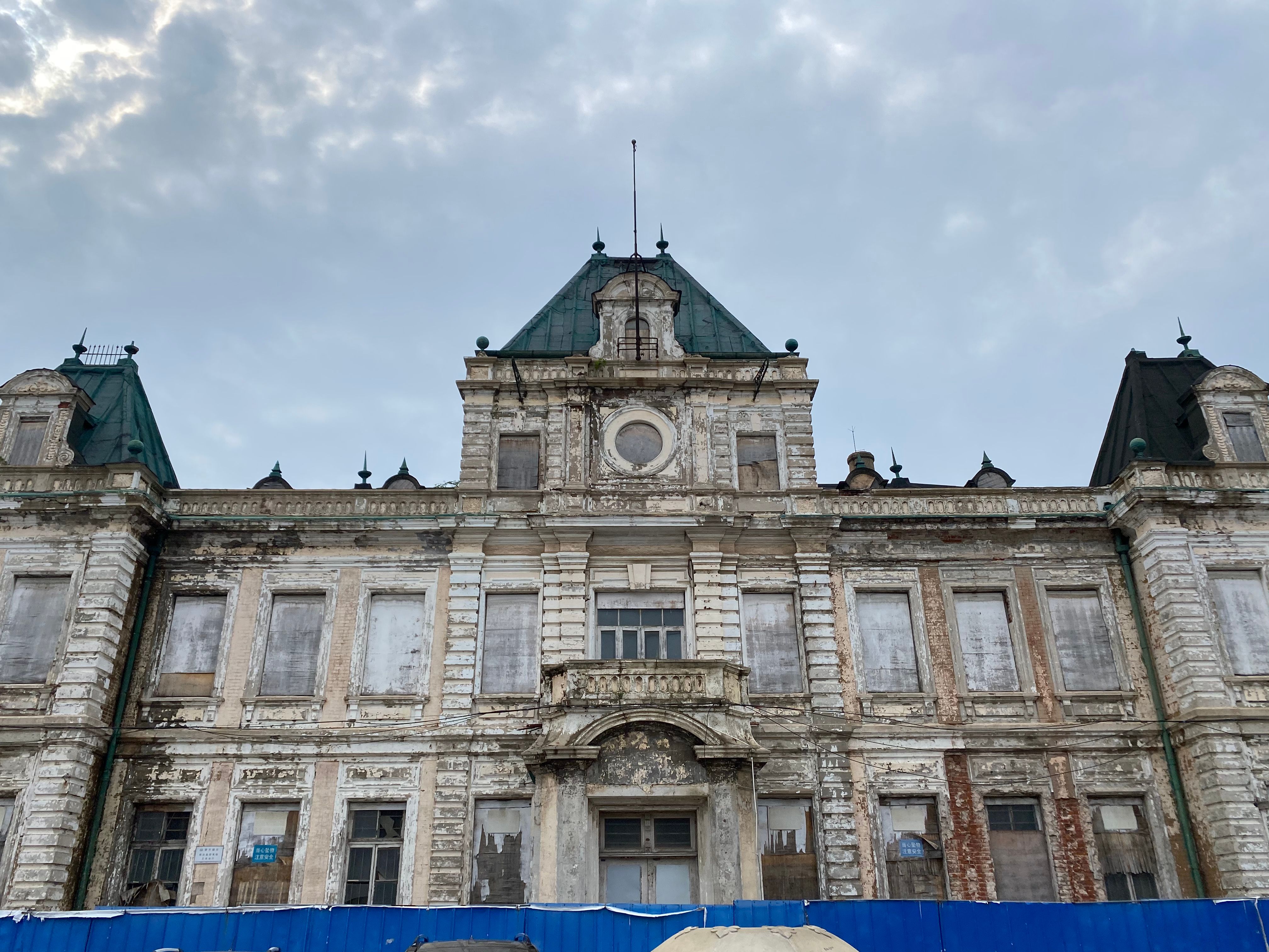 A Low Angle Shot of a Concrete Building Under the Cloudy Sky · Free ...