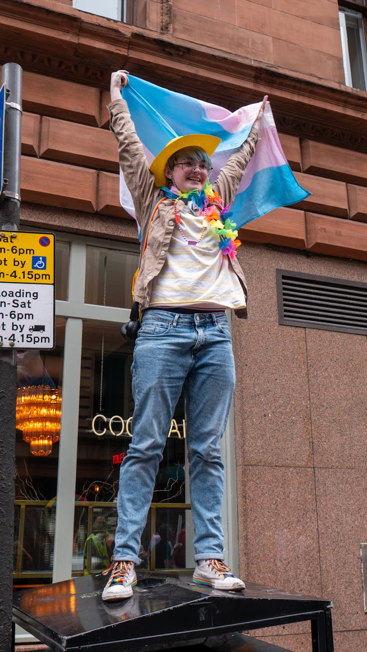 Full Shot Of A Person Raising A Flag