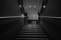 Low Angle Shot of Stairs in Grayscale Photography