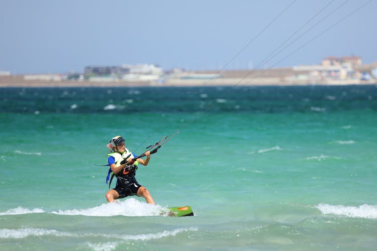 Sgot Of Woman Windsurfing