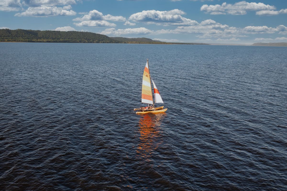 A catamaran sailing on the water