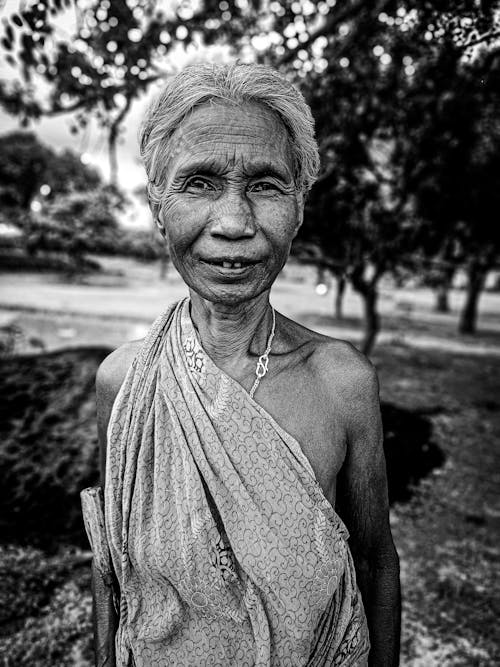 Grayscale Photo of Elderly Woman