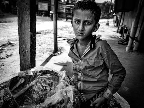 Grayscale Photo of a Boy