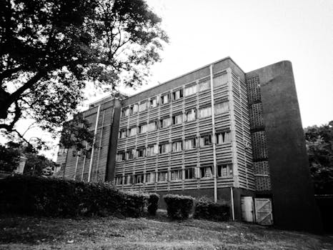 Black and white photo capturing a modern building exterior in Kampala, Uganda.