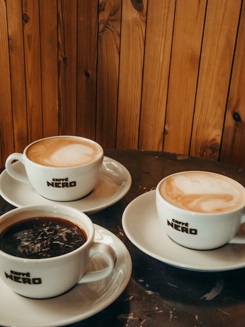 Free Cups of Coffee on a Round Table Stock Photo