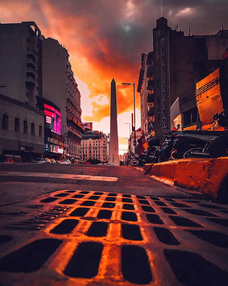 A View Of The Obelisk Of Buenos Aires From A Street In Argentina