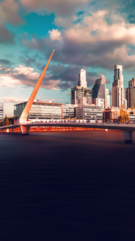Stunning view of Puente de la Mujer with city skyline backdrop in Buenos Aires, Argentina.