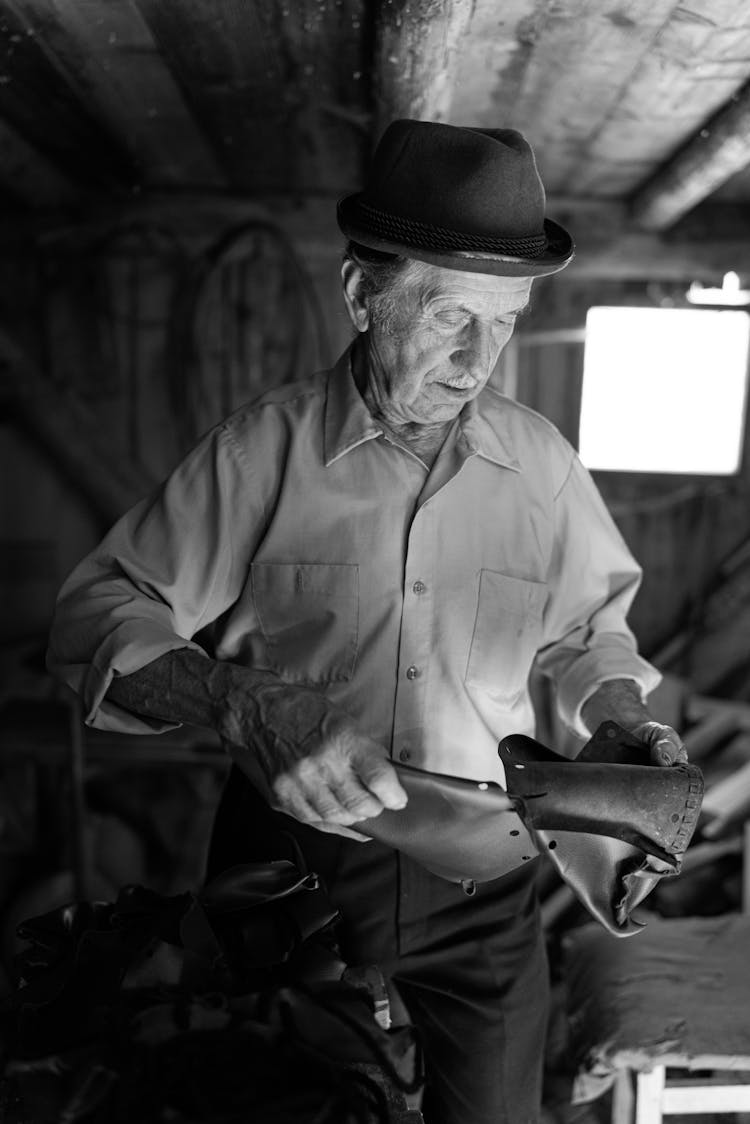 Man In Shirt And Hat In Black And White