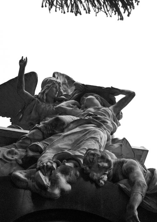 Free Low angle view of an expressive angel sculpture in Buenos Aires, Argentina. Stock Photo