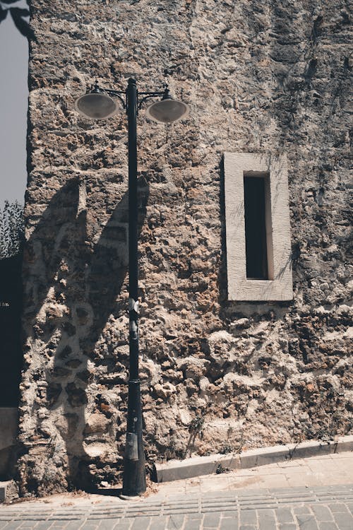 Lamp Post Beside the Rock Wall 