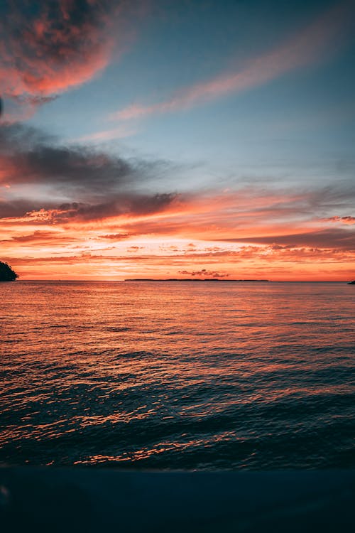 Ocean View Under Orange Sky